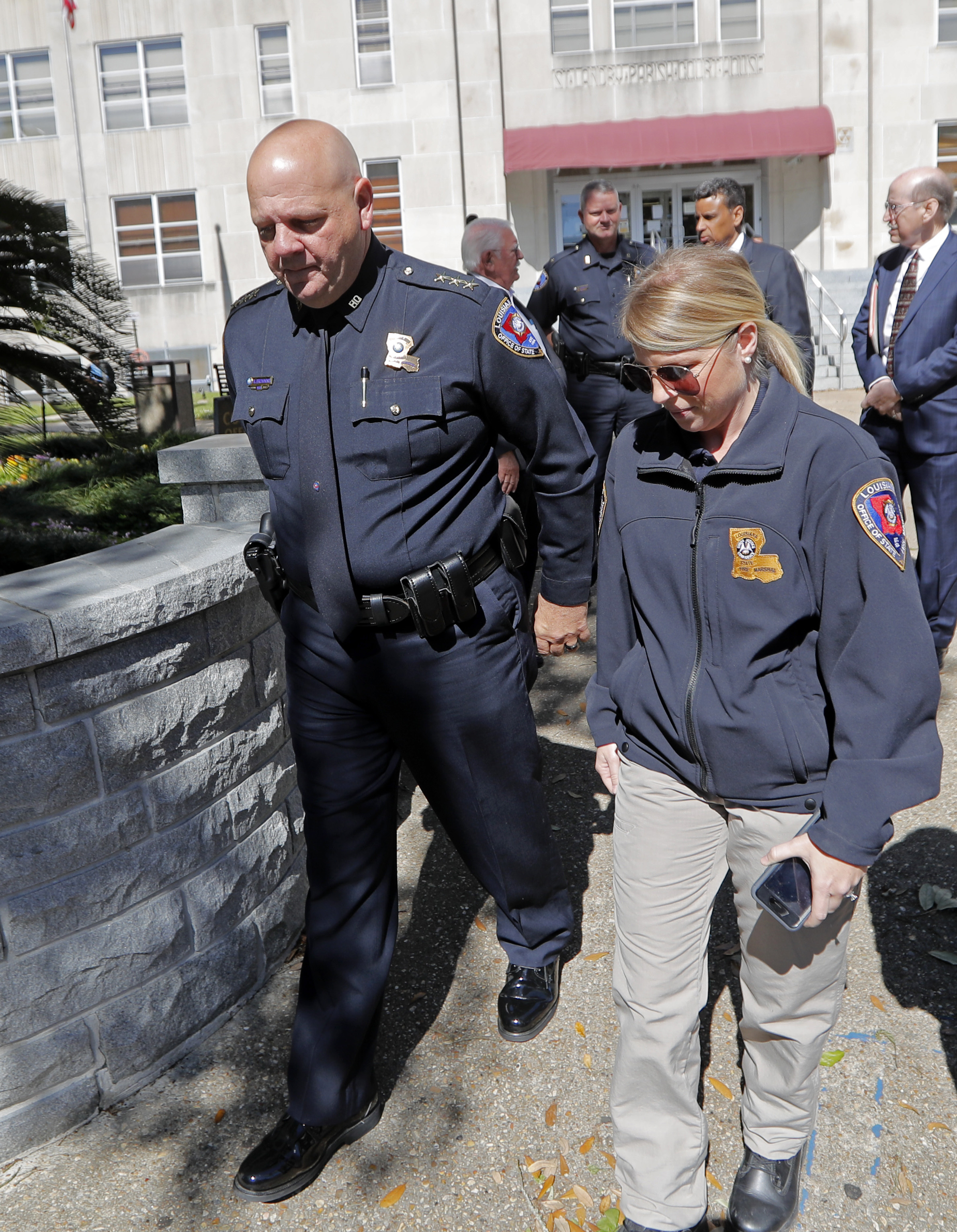 Louisiana State Fire Marshal Butch Browning leaves the St. Landry Parish courthouse after a bond hearing for Holden Matthews in Opelousas, La., Monday, April 15, 2019. Matthews, who is white, and is the son of a St. Landry Parish sheriff's deputy, was arrested Wednesday on three charges of arson of a religious building, and is the suspect in three recent arson fires that destroyed African American churches in Louisiana. (AP Photo/Gerald Herbert) Louisiana State Fire Marshal Butch Browning leaves the St. Landry Parish courthouse after a bond hearing for Holden Matthews in Opelousas, La., Monday, April 15, 2019. Matthews, who is white, and is the son of a St. Landry Parish sheriff's deputy, was arrested Wednesday on three charges of arson of a religious building, and is the suspect in three recent arson fires that destroyed African American churches in Louisiana. (AP Photo/Gerald Herbert)
