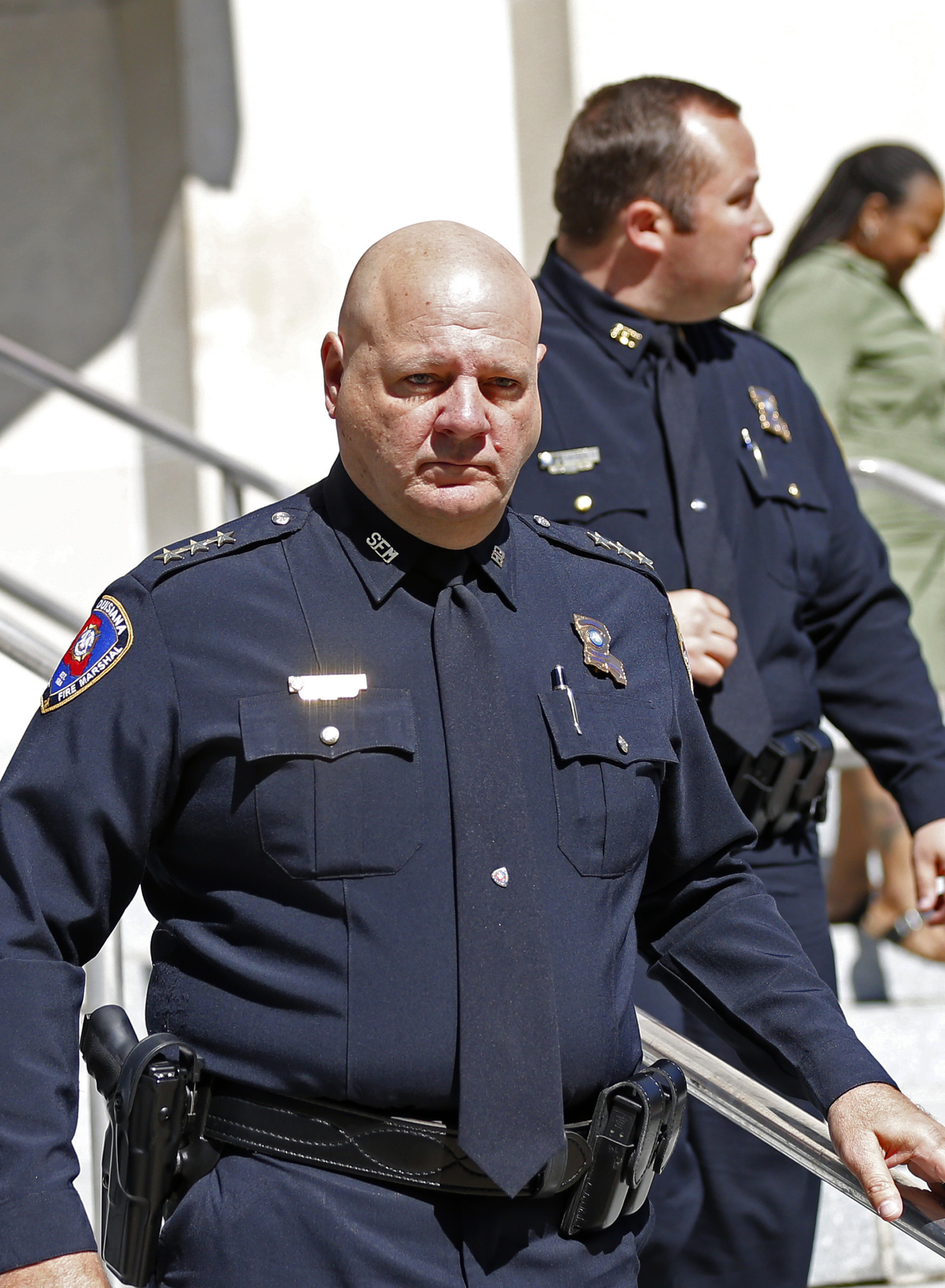 Louisiana State Fire Marshal Butch Browning leaves the St. Landry Parish courthouse after a bond hearing for Holden Matthews in Opelousas, La., Monday, April 15, 2019. Matthews, who is white, and is the son of a St. Landry Parish sheriff's deputy, was arrested Wednesday on three charges of arson of a religious building, and is the suspect in three recent arson fires that destroyed African American churches in Louisiana. (AP Photo/Gerald Herbert) Louisiana State Fire Marshal Butch Browning leaves the St. Landry Parish courthouse after a bond hearing for Holden Matthews in Opelousas, La., Monday, April 15, 2019. Matthews, who is white, and is the son of a St. Landry Parish sheriff's deputy, was arrested Wednesday on three charges of arson of a religious building, and is the suspect in three recent arson fires that destroyed African American churches in Louisiana. (AP Photo/Gerald Herbert)