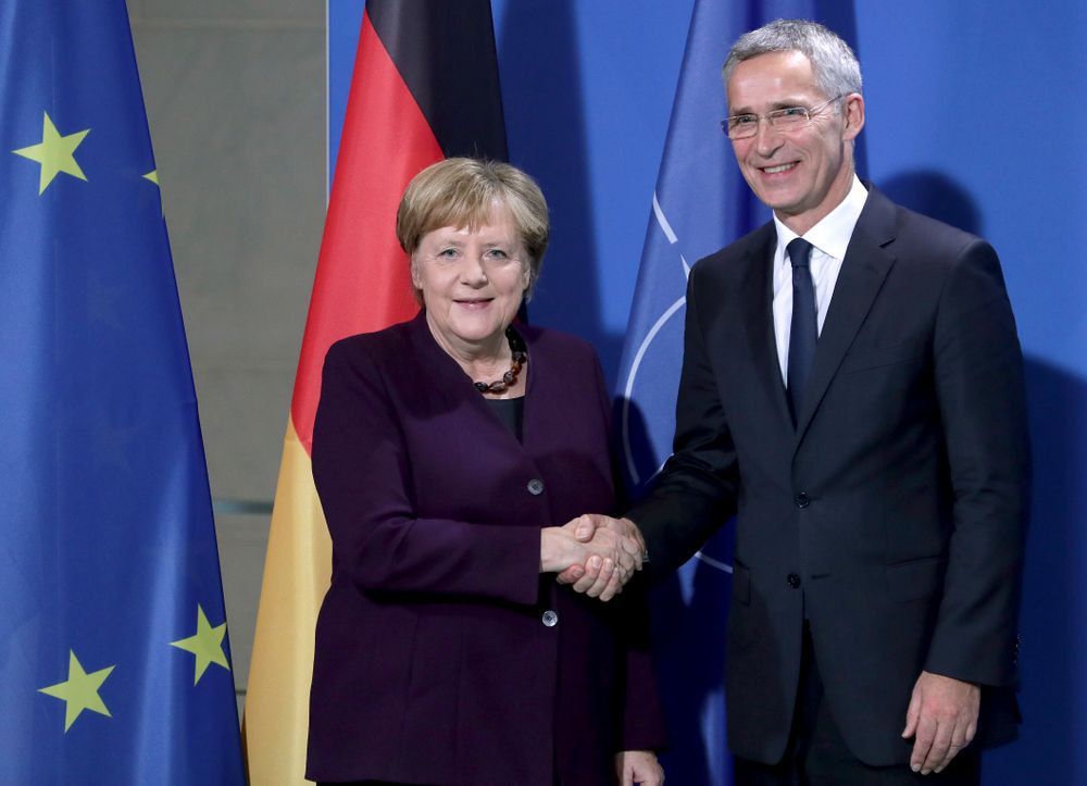 German Chancellor Angela Merkel, left, and NATO Secretary General Jens Stoltenberg, right, shake hands after a joint a press conference at the Chancellery in Berlin, Germany, Thursday, Nov. 7, 2019. (AP Photo/Michael Sohn) German Chancellor Angela Merkel, left, and NATO Secretary General Jens Stoltenberg, right, shake hands after a joint a press conference at the Chancellery in Berlin, Germany, Thursday, Nov. 7, 2019. (AP Photo/Michael Sohn)