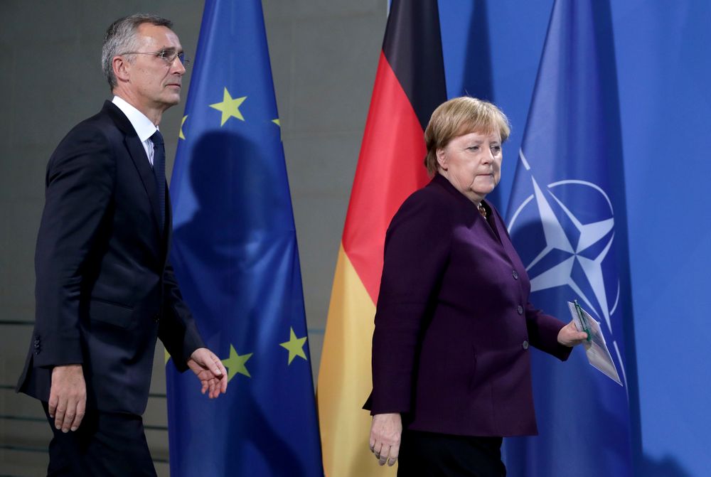 German Chancellor Angela Merkel, right, and NATO Secretary General Jens Stoltenberg, left, arrive for a press conference after a meeting at the Chancellery in Berlin, Germany, Thursday, Nov. 7, 2019. (AP Photo/Michael Sohn) German Chancellor Angela Merkel, right, and NATO Secretary General Jens Stoltenberg, left, arrive for a press conference after a meeting at the Chancellery in Berlin, Germany, Thursday, Nov. 7, 2019. (AP Photo/Michael Sohn)