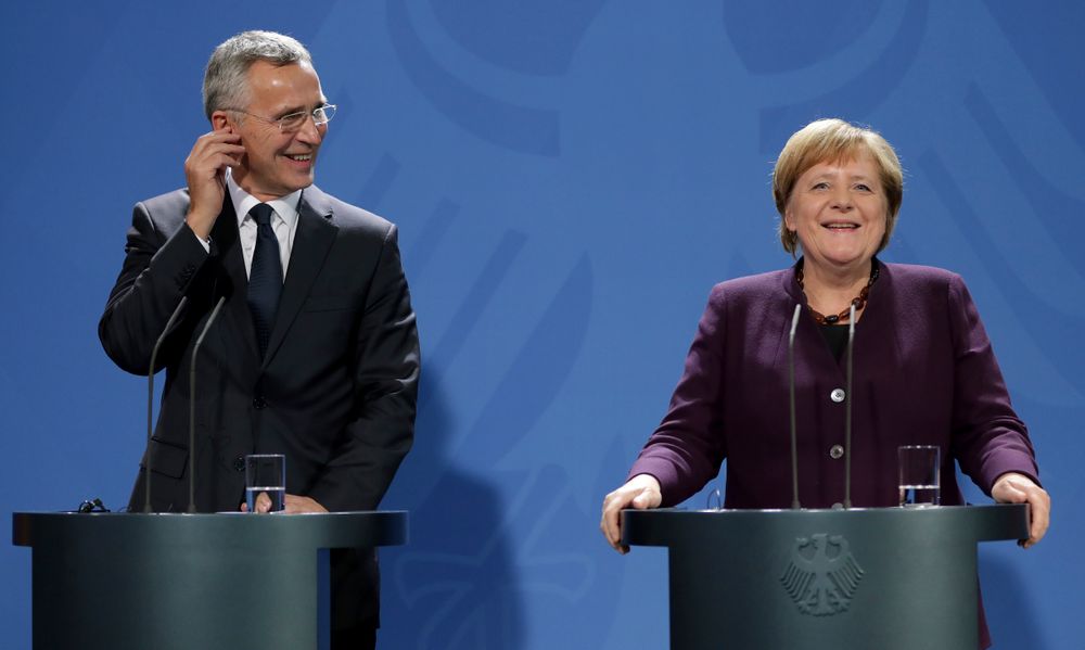German Chancellor Angela Merkel, right, and NATO Secretary General Jens Stoltenberg, left, address the media during a press conference at the Chancellery in Berlin, Germany, Thursday, Nov. 7, 2019. (AP Photo/Michael Sohn) German Chancellor Angela Merkel, right, and NATO Secretary General Jens Stoltenberg, left, address the media during a press conference at the Chancellery in Berlin, Germany, Thursday, Nov. 7, 2019. (AP Photo/Michael Sohn)