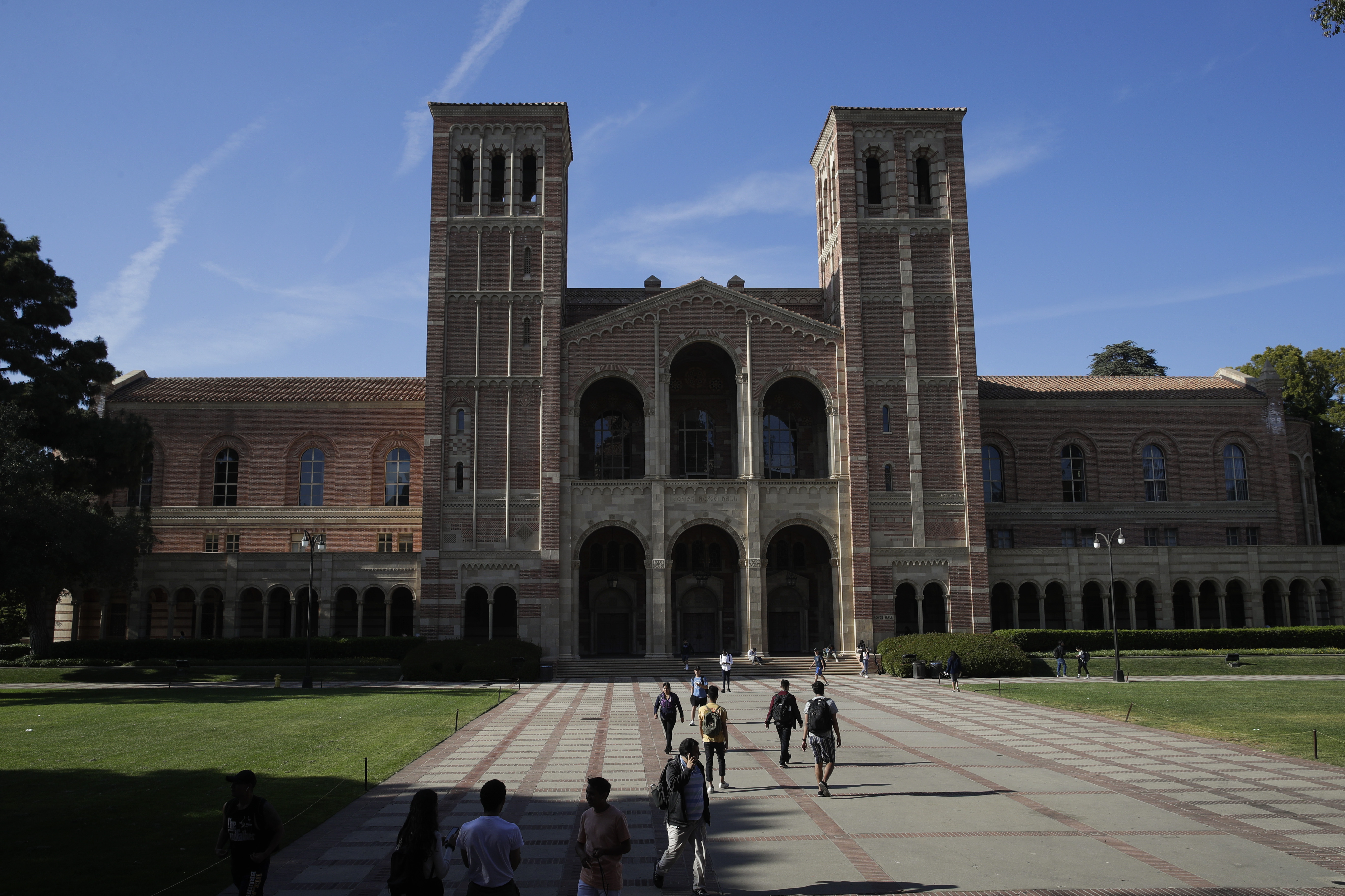 Students walk past Royce Hall at the University of California, Los Angeles Thursday, April 25, 2019, in the Westwood section of Los Angeles. Hundreds of students and staff at two Los Angeles universities, including UCLA, have been placed under quarantine because they may have been exposed to measles. Officials say the people affected by the order either have not been vaccinated or cannot verify that they are immune. (AP Photo/Jae C. Hong) Students walk past Royce Hall at the University of California, Los Angeles Thursday, April 25, 2019, in the Westwood section of Los Angeles. Hundreds of students and staff at two Los Angeles universities, including UCLA, have been placed under quarantine because they may have been exposed to measles. Officials say the people affected by the order either have not been vaccinated or cannot verify that they are immune. (AP Photo/Jae C. Hong)