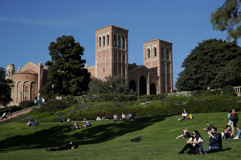 Students sit on the lawn near Royce Hall at UCLA Thursday, April 25, 2019, in the Westwood section of Los Angeles. Hundreds of students and staff at two Los Angeles universities, including UCLA, have been placed under quarantine because they may have been exposed to measles. Officials say the people affected by the order either have not been vaccinated or cannot verify that they are immune. (AP Photo/Jae C. Hong) Students sit on the lawn near Royce Hall at UCLA Thursday, April 25, 2019, in the Westwood section of Los Angeles. Hundreds of students and staff at two Los Angeles universities, including UCLA, have been placed under quarantine because they may have been exposed to measles. Officials say the people affected by the order either have not been vaccinated or cannot verify that they are immune. (AP Photo/Jae C. Hong)