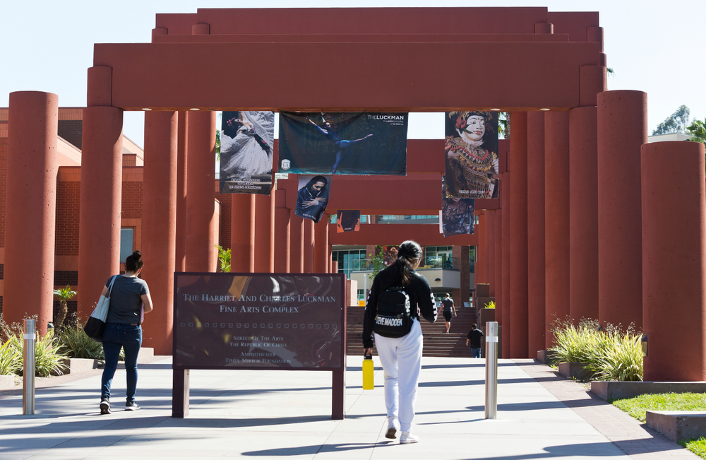 Students walk past the Harriet and Charles Luckman Fine Arts Complex at the The Cal State University, Los Angeles campus Thursday, April 25, 2019. Hundreds of students and staff at two Los Angeles universities, including Cal State University, have been placed under quarantine because they may have been exposed to measles and either have not been vaccinated or cannot verify that they are immune, officials said Thursday. (AP Photo/Damian Dovarganes) Students walk past the Harriet and Charles Luckman Fine Arts Complex at the The Cal State University, Los Angeles campus Thursday, April 25, 2019. Hundreds of students and staff at two Los Angeles universities, including Cal State University, have been placed under quarantine because they may have been exposed to measles and either have not been vaccinated or cannot verify that they are immune, officials said Thursday. (AP Photo/Damian Dovarganes)