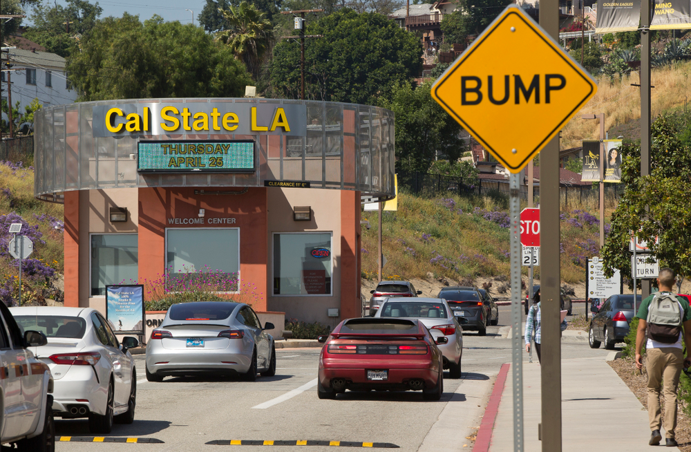 Students drive to Cal State University, Los Angeles campus Thursday, April 25, 2019. Hundreds of students and staff at two Los Angeles universities, including Cal State University, have been placed under quarantine because they may have been exposed to measles. Officials say the people affected by the order either have not been vaccinated or cannot verify that they are immune. (AP Photo/Damian Dovarganes) Students drive to Cal State University, Los Angeles campus Thursday, April 25, 2019. Hundreds of students and staff at two Los Angeles universities, including Cal State University, have been placed under quarantine because they may have been exposed to measles. Officials say the people affected by the order either have not been vaccinated or cannot verify that they are immune. (AP Photo/Damian Dovarganes)