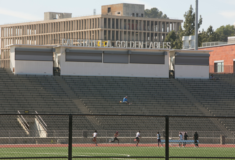 CORRECTS TO ORDER ISSUED LATE WEDNESDAY Students practice track at the Cal State University, Los Angeles campus Thursday, April 25, 2019. A quarantine order was issued late Wednesday for hundreds of students and staff at two Los Angeles universities, including Cal State University, who may have been exposed to measles and either have not been vaccinated or can't verify that they have immunity. (AP Photo/Damian Dovarganes) CORRECTS TO ORDER ISSUED LATE WEDNESDAY Students practice track at the Cal State University, Los Angeles campus Thursday, April 25, 2019. A quarantine order was issued late Wednesday for hundreds of students and staff at two Los Angeles universities, including Cal State University, who may have been exposed to measles and either have not been vaccinated or can't verify that they have immunity. (AP Photo/Damian Dovarganes)