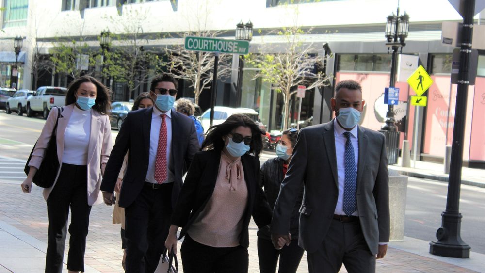Correia's fiance and family members accompany him into Boston's federal court on Thursday, May 13, 2021.