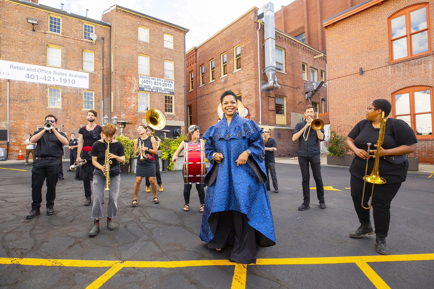 RISD President Crystal Williams on inauguration day with Undertow Brass Band