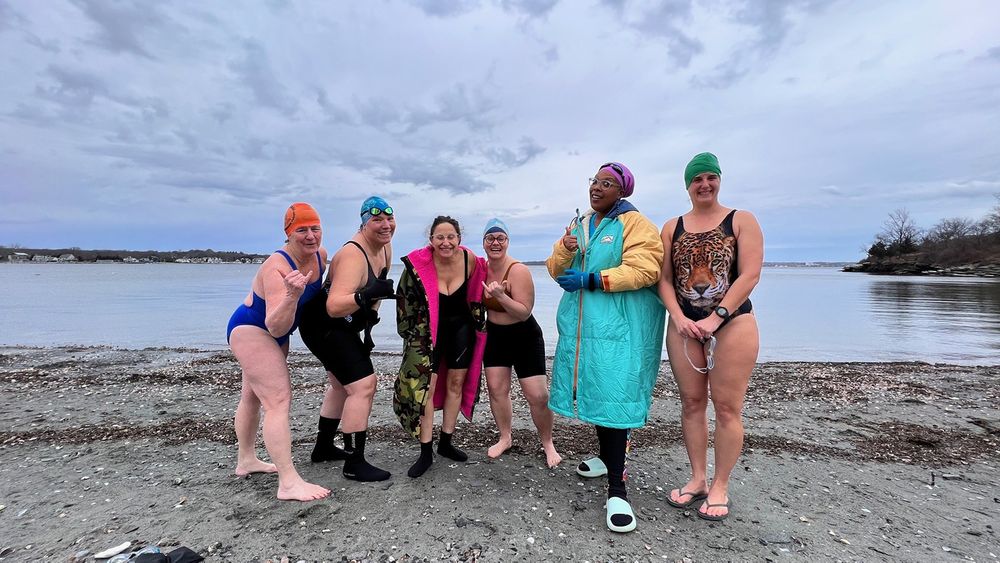 A group of local winter swimmers pose for a portrait before they swim at Potter Cover in Jamestown, Rhode Island, on Sunday, Jan. 29, 2023. From left: Cheryl Hatch, Catherine Davis Hayes, Natalie Coletta, Kelly Phillips, Jess Brown and Christina Lorenson.