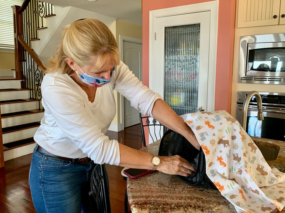 Kristin Fletcher adjusts fleece inside her 