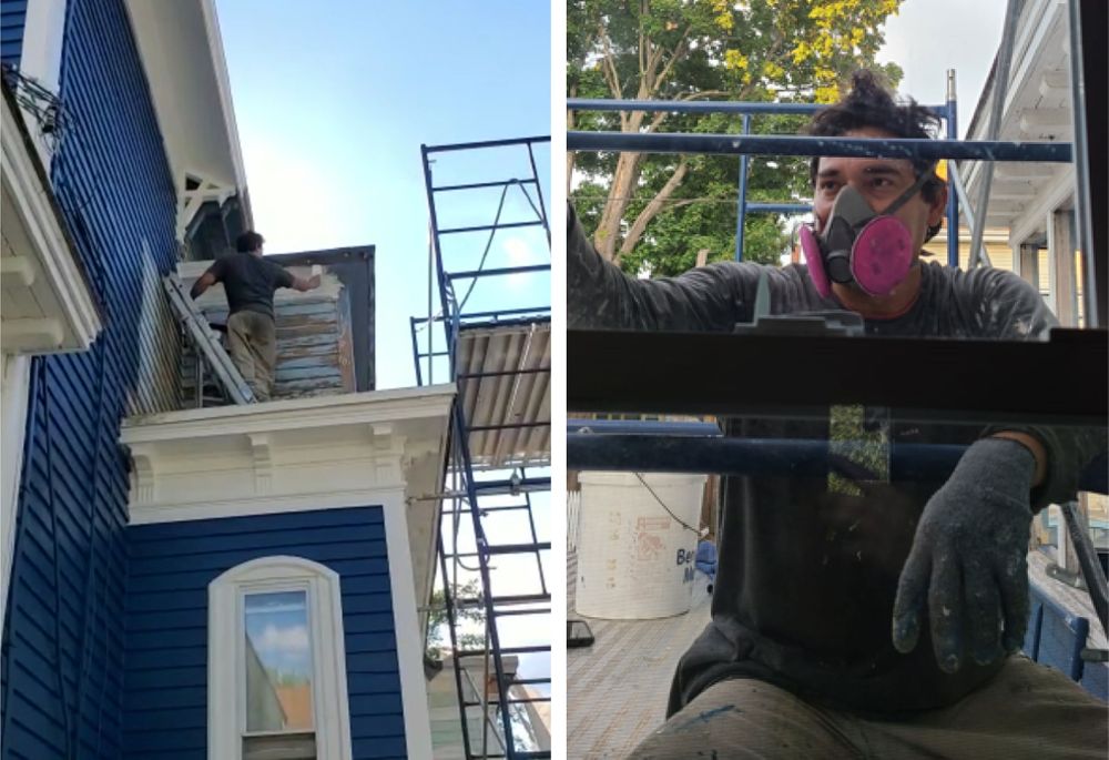 Omar Benitez at work on the exterior of his house in Central Falls. 