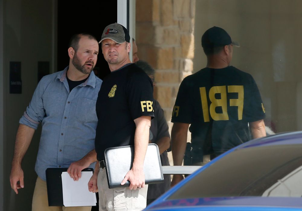 Law enforcement officials investigate Saturday's shooting at a shopping center Sunday, Sept. 1, 2019, in Odessa, Texas. (AP Photo/Sue Ogrocki) Law enforcement officials investigate Saturday's shooting at a shopping center Sunday, Sept. 1, 2019, in Odessa, Texas. (AP Photo/Sue Ogrocki)