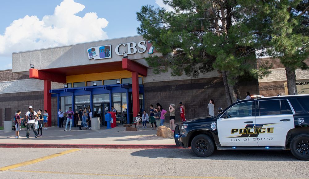 Odessa police officers park their vehicle outside Music City Mall in Odessa, Texas, Saturday, Aug. 31, 2019, as they investigate areas following a deadly shooting in the area of Odessa and Midland. Several people were dead after a gunman who hijacked a postal service vehicle in West Texas shot more than 20 people, authorities said Saturday. The gunman was killed and a few law enforcement officers were among the injured. (Jacy Lewis/Reporter-Telegram via AP) Odessa police officers park their vehicle outside Music City Mall in Odessa, Texas, Saturday, Aug. 31, 2019, as they investigate areas following a deadly shooting in the area of Odessa and Midland. Several people were dead after a gunman who hijacked a postal service vehicle in West Texas shot more than 20 people, authorities said Saturday. The gunman was killed and a few law enforcement officers were among the injured. (Jacy Lewis/Reporter-Telegram via AP)