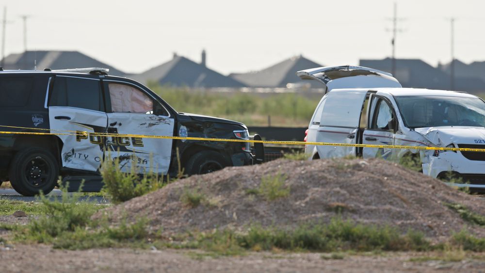 A city of Odessa police car, left, and a U.S. mail vehicle, right, which were involved in Saturday's shooting, are pictured outside the Cinergy entertainment center, Sunday, Sept. 1, 2019, in Odessa, Texas. The death toll in the West Texas shooting rampage increased Sunday as authorities investigated why a man stopped by state troopers for failing to signal a left turn opened fire on them and fled, shooting over a dozen people as he drove before being killed by officers outside a movie theater. (AP Photo/Sue Ogrocki) A city of Odessa police car, left, and a U.S. mail vehicle, right, which were involved in Saturday's shooting, are pictured outside the Cinergy entertainment center, Sunday, Sept. 1, 2019, in Odessa, Texas. The death toll in the West Texas shooting rampage increased Sunday as authorities investigated why a man stopped by state troopers for failing to signal a left turn opened fire on them and fled, shooting over a dozen people as he drove before being killed by officers outside a movie theater. (AP Photo/Sue Ogrocki)