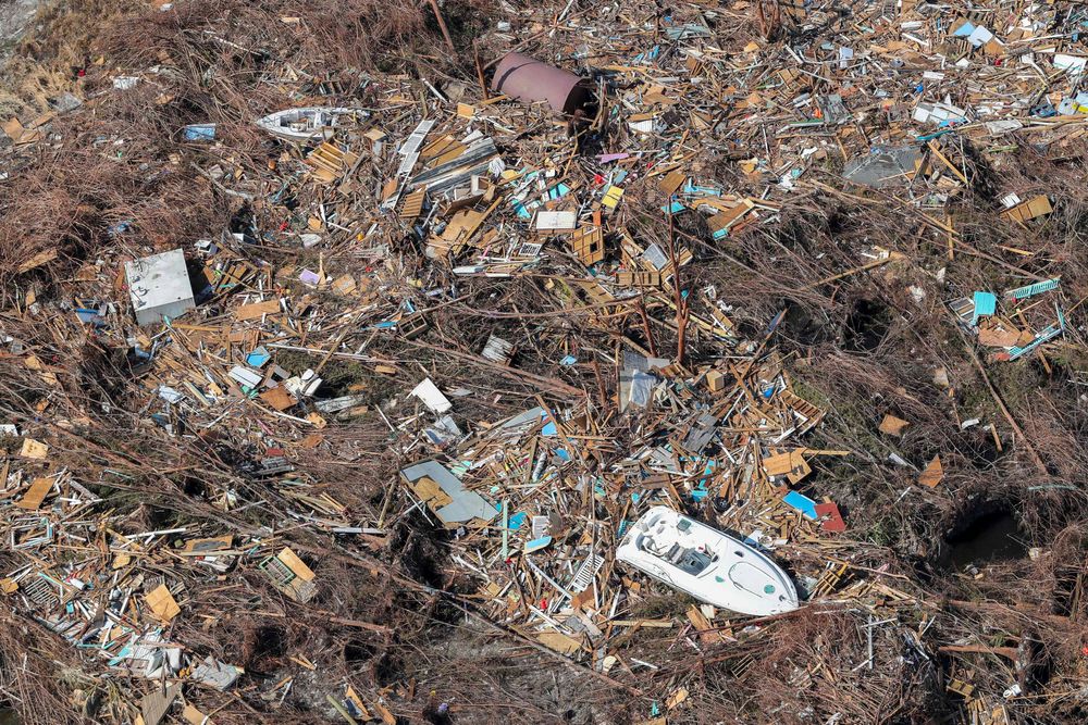 In this handout photo provided by the Dutch Defense Ministry taken on Wednesday, Sept. 11, 2019, the aftermath of Hurricane Dorian is seen on the island of Abaco in the Bahamas. Two Dutch navy ships have arrived in the Bahamas to help with the relief operation after the region was devastated by Hurricane Dorian. The Defense Ministry says that around 550 military personnel who arrived Wednesday on board the ships Snellius and Johan de Witt will deliver aid to residents on Abaco island. (Sjoerd Hilckmann/Dutch Defense Ministry via AP) In this handout photo provided by the Dutch Defense Ministry taken on Wednesday, Sept. 11, 2019, the aftermath of Hurricane Dorian is seen on the island of Abaco in the Bahamas. Two Dutch navy ships have arrived in the Bahamas to help with the relief operation after the region was devastated by Hurricane Dorian. The Defense Ministry says that around 550 military personnel who arrived Wednesday on board the ships Snellius and Johan de Witt will deliver aid to residents on Abaco island. (Sjoerd Hilckmann/Dutch Defense Ministry via AP)