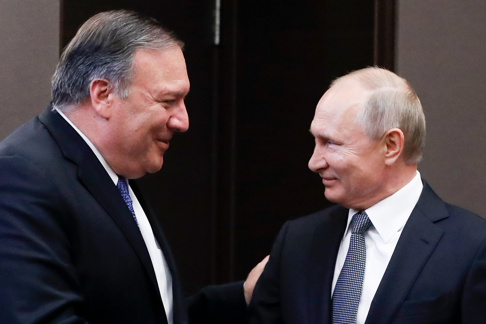 Russian President Vladimir Putin, right, and U.S. Secretary of State Mike Pompeo, greet each other prior to their talks in the Black Sea resort city of Sochi, southern Russia, Tuesday, May 14, 2019. Pompeo arrived in Russia for talks that are expected to focus on an array of issues including arms control and Iran. (AP Photo/Pavel Golovkin, Pool) Russian President Vladimir Putin, right, and U.S. Secretary of State Mike Pompeo, greet each other prior to their talks in the Black Sea resort city of Sochi, southern Russia, Tuesday, May 14, 2019. Pompeo arrived in Russia for talks that are expected to focus on an array of issues including arms control and Iran. (AP Photo/Pavel Golovkin, Pool)