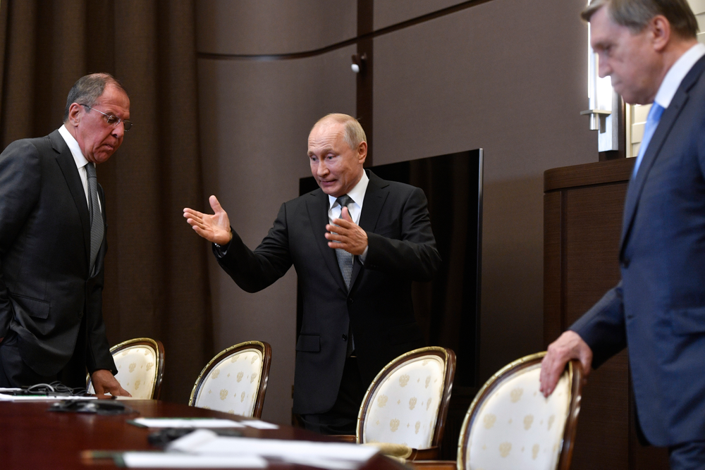 Russian President Vladimir Putin, center, welcomes Russian Foreign Minister Sergey Lavrov, left, and Kremlin foreign policy aide Yuri Ushakov for the talks with U.S. Secretary of State Mike Pompeo, during their meeting in the Black Sea resort city of Sochi, southern Russia, Tuesday, May 14, 2019. Pompeo arrived in Russia for talks that are expected to focus on an array of issues including arms control and Iran. (Alexander Nemenov/Pool Photo via AP) Russian President Vladimir Putin, center, welcomes Russian Foreign Minister Sergey Lavrov, left, and Kremlin foreign policy aide Yuri Ushakov for the talks with U.S. Secretary of State Mike Pompeo, during their meeting in the Black Sea resort city of Sochi, southern Russia, Tuesday, May 14, 2019. Pompeo arrived in Russia for talks that are expected to focus on an array of issues including arms control and Iran. (Alexander Nemenov/Pool Photo via AP)