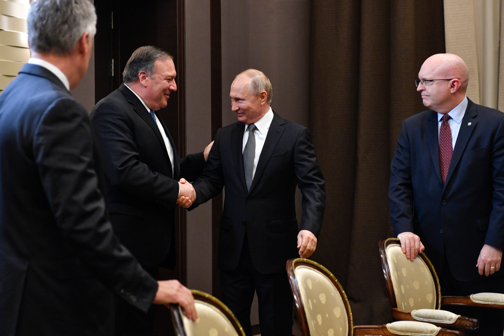Russian President Vladimir Putin, second right, and U.S. Secretary of State Mike Pompeo, second left, greet each other prior to their talks in the Black Sea resort city of Sochi, southern Russia, Tuesday, May 14, 2019. Pompeo arrived in Russia for talks that are expected to focus on an array of issues including arms control and Iran. (Alexander Nemenov/Pool Photo via AP) Russian President Vladimir Putin, second right, and U.S. Secretary of State Mike Pompeo, second left, greet each other prior to their talks in the Black Sea resort city of Sochi, southern Russia, Tuesday, May 14, 2019. Pompeo arrived in Russia for talks that are expected to focus on an array of issues including arms control and Iran. (Alexander Nemenov/Pool Photo via AP)