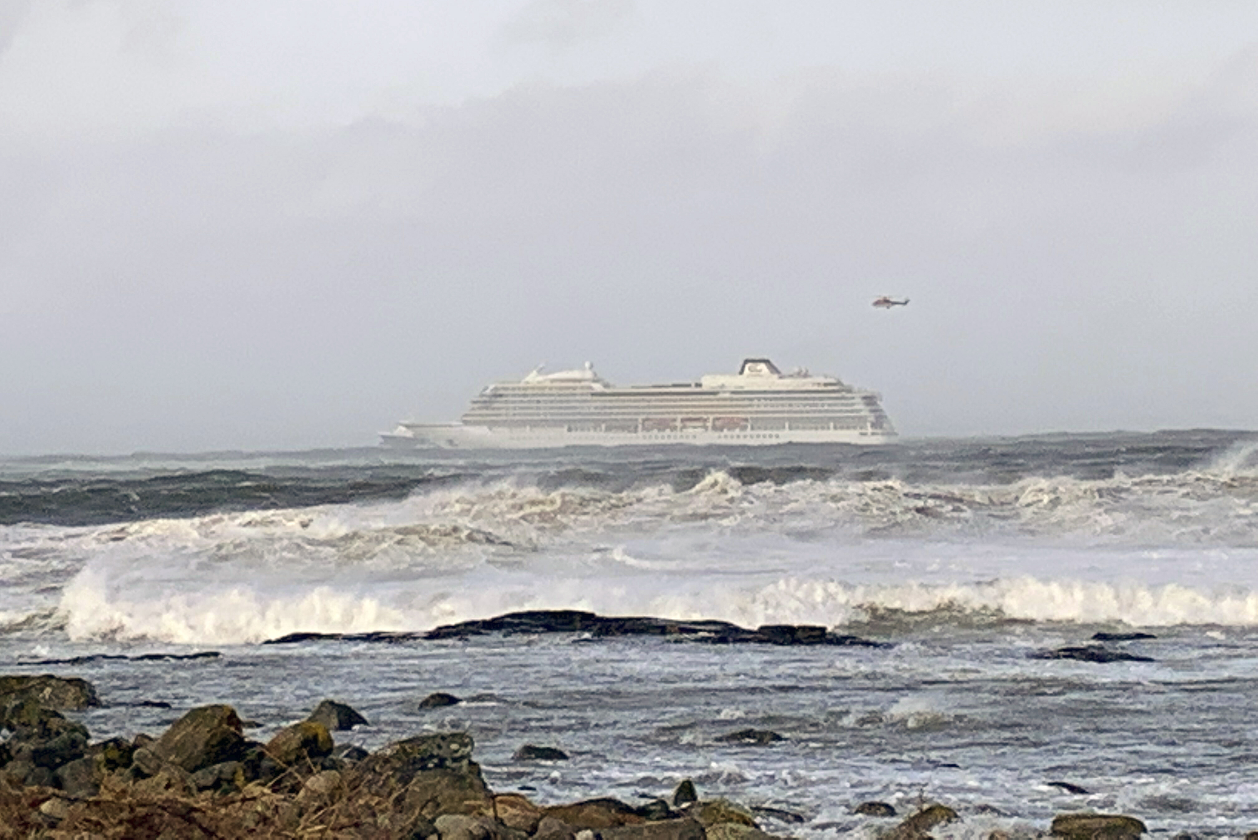 The cruise ship Viking Sky after it sent out a Mayday signal because of engine failure in windy conditions off the west coast of Norway, Saturday March 23, 2019. The Viking Sky is forced to evacuate its 1,300 passengers. (Odd Roar Lange / NTB scanpix via AP) The cruise ship Viking Sky after it sent out a Mayday signal because of engine failure in windy conditions off the west coast of Norway, Saturday March 23, 2019. The Viking Sky is forced to evacuate its 1,300 passengers. (Odd Roar Lange / NTB scanpix via AP)
