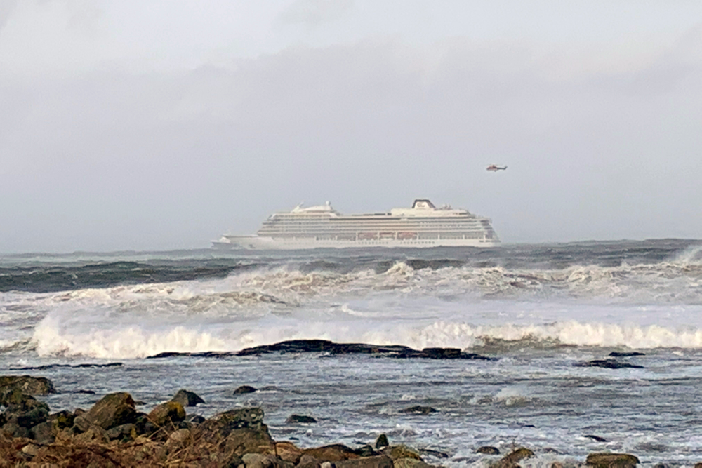 The cruise ship Viking Sky after it sent out a Mayday signal because of engine failure in windy conditions off the west coast of Norway, Saturday March 23, 2019. The Viking Sky is forced to evacuate its 1,300 passengers. (Odd Roar Lange / NTB scanpix via AP) The cruise ship Viking Sky after it sent out a Mayday signal because of engine failure in windy conditions off the west coast of Norway, Saturday March 23, 2019. The Viking Sky is forced to evacuate its 1,300 passengers. (Odd Roar Lange / NTB scanpix via AP)