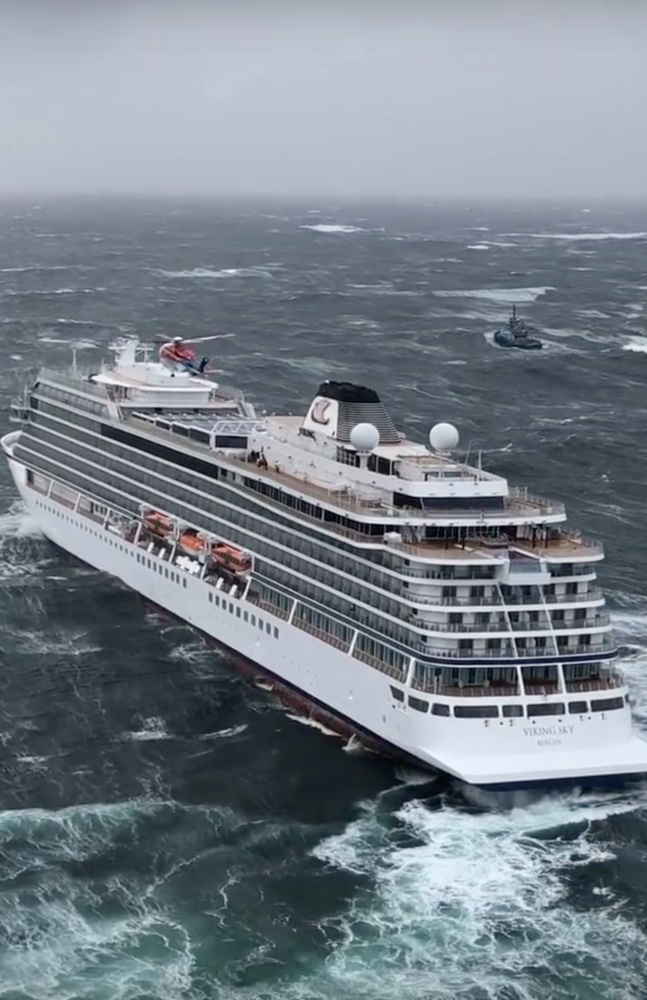 In this image taken from video made available by CHC helicopters, helicopters fly over the cruise ship Viking Sky after it sent out a Mayday signal because of engine failure in windy conditions off the west coast of Norway, Saturday March 23, 2019. A cruise ship with engine problems sent a mayday call off Norway's western coast on Saturday, then began evacuating its 1,300 passengers and crew amid stormy seas and heavy winds in a high-risk helicopter rescue operation. (CHC helicopters via AP) In this image taken from video made available by CHC helicopters, helicopters fly over the cruise ship Viking Sky after it sent out a Mayday signal because of engine failure in windy conditions off the west coast of Norway, Saturday March 23, 2019. A cruise ship with engine problems sent a mayday call off Norway's western coast on Saturday, then began evacuating its 1,300 passengers and crew amid stormy seas and heavy winds in a high-risk helicopter rescue operation. (CHC helicopters via AP)