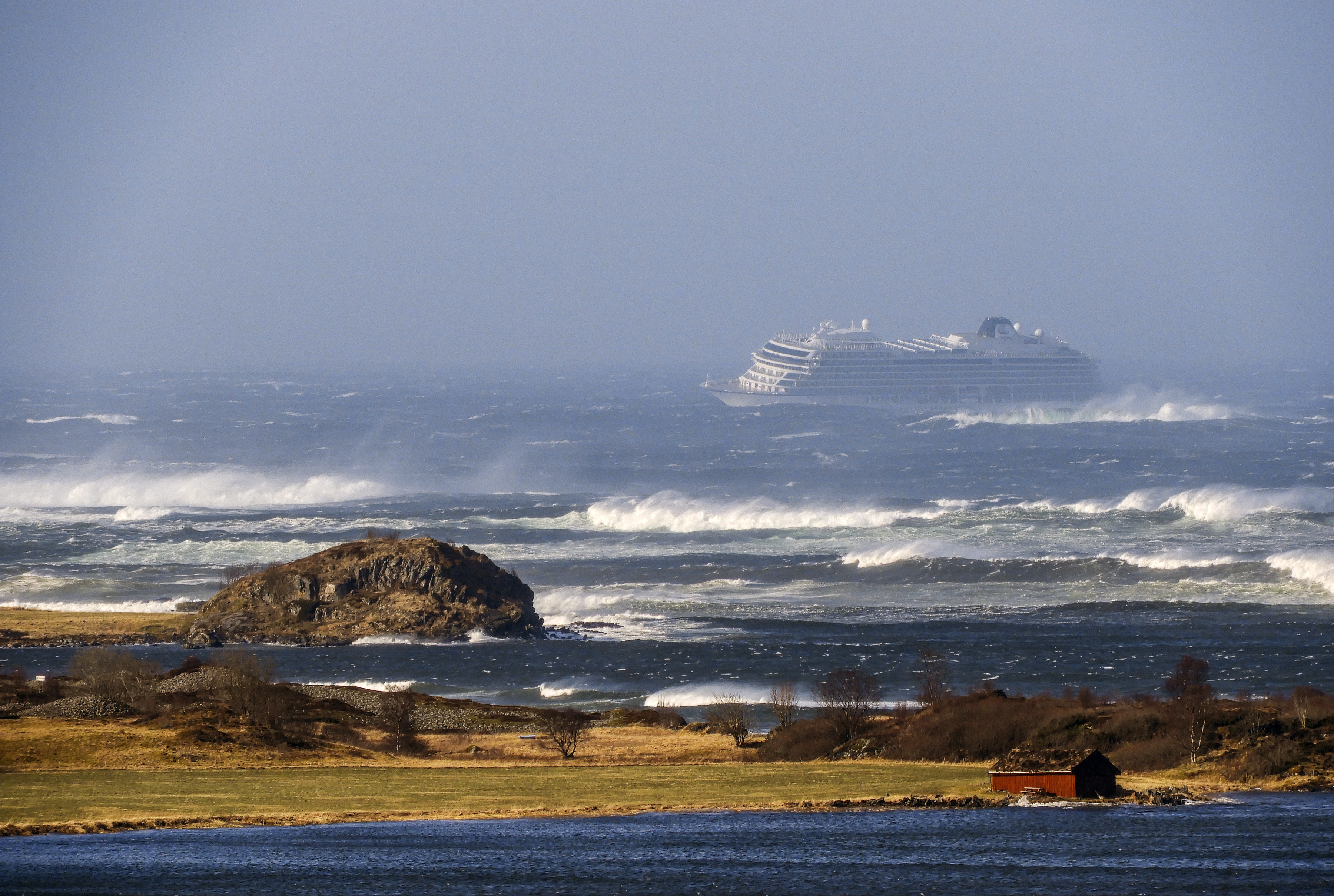 The cruise ship Viking Sky as it drifts after sending a Mayday signal because of engine failure in windy conditions near Hustadvika, off the west coast of Norway, Saturday March 23, 2019. The Viking Sky is forced to evacuate its estimated 1,300 passengers. (Odd Roar Lange / NTB scanpix via AP) The cruise ship Viking Sky as it drifts after sending a Mayday signal because of engine failure in windy conditions near Hustadvika, off the west coast of Norway, Saturday March 23, 2019. The Viking Sky is forced to evacuate its estimated 1,300 passengers. (Odd Roar Lange / NTB scanpix via AP)