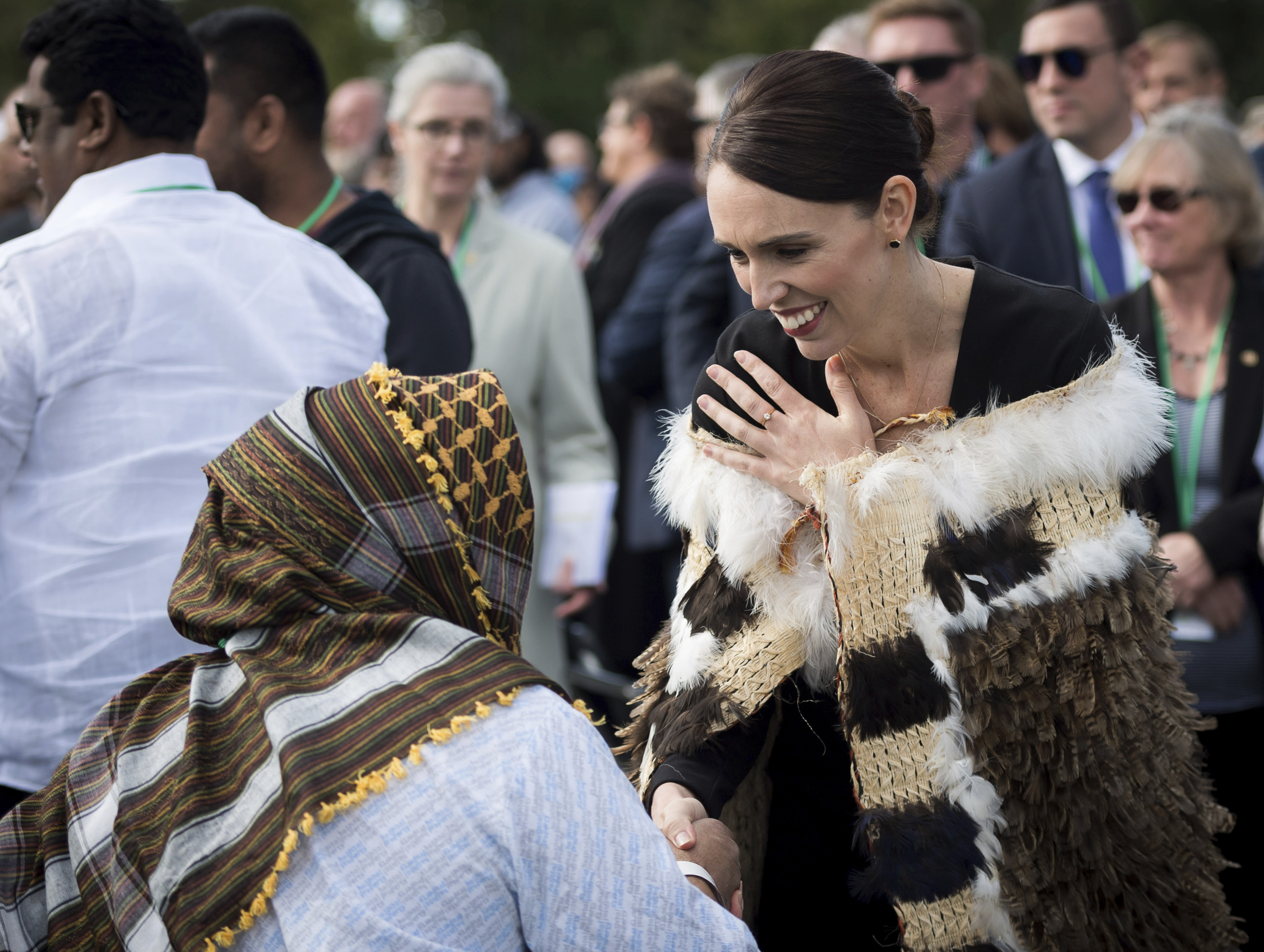In this photo supplied by the New Zealand government, New Zealand Prime Minister Jacinda Ardern meets members of the Muslim community following the national remembrance service for the victims of the March 15 mosques terrorist attack in Hagley Park, Christchurch, New Zealand, Friday, March 29, 2019. (Mark Tantrum/New Zealand Government via AP) In this photo supplied by the New Zealand government, New Zealand Prime Minister Jacinda Ardern meets members of the Muslim community following the national remembrance service for the victims of the March 15 mosques terrorist attack in Hagley Park, Christchurch, New Zealand, Friday, March 29, 2019. (Mark Tantrum/New Zealand Government via AP)
