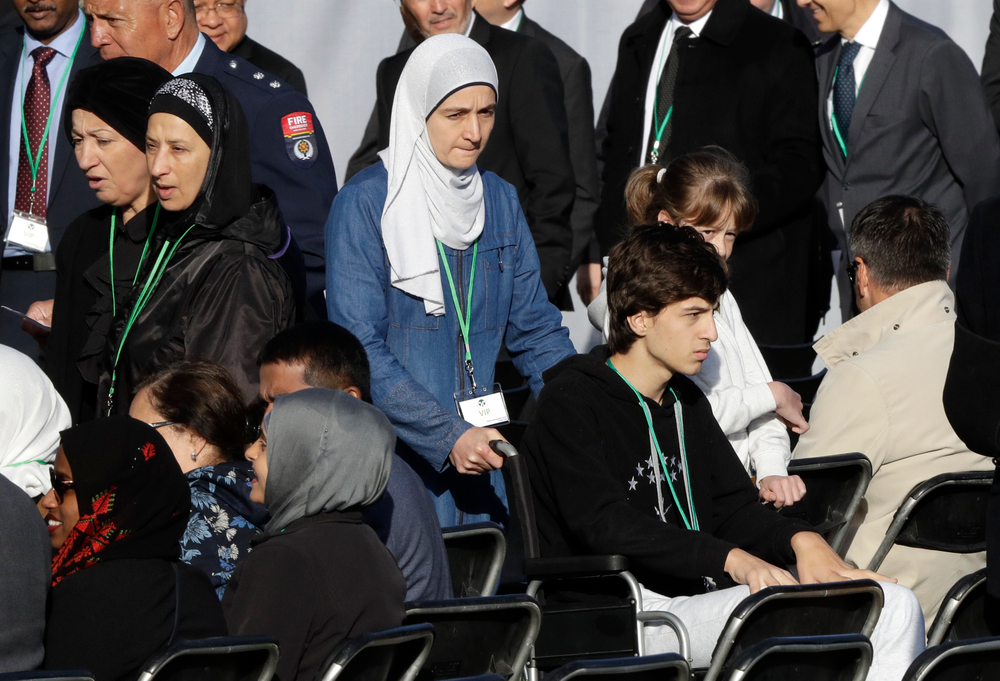 Mosque shooting survivor Zaid Mustafa, in wheelchair arrives with his mother to the National Remembrance Service in Hagley Park for the victims of the March 15 mosques terrorist attack in Christchurch, New Zealand, Friday, March 29, 2019. (AP Photo/Mark Baker) Mosque shooting survivor Zaid Mustafa, in wheelchair arrives with his mother to the National Remembrance Service in Hagley Park for the victims of the March 15 mosques terrorist attack in Christchurch, New Zealand, Friday, March 29, 2019. (AP Photo/Mark Baker)