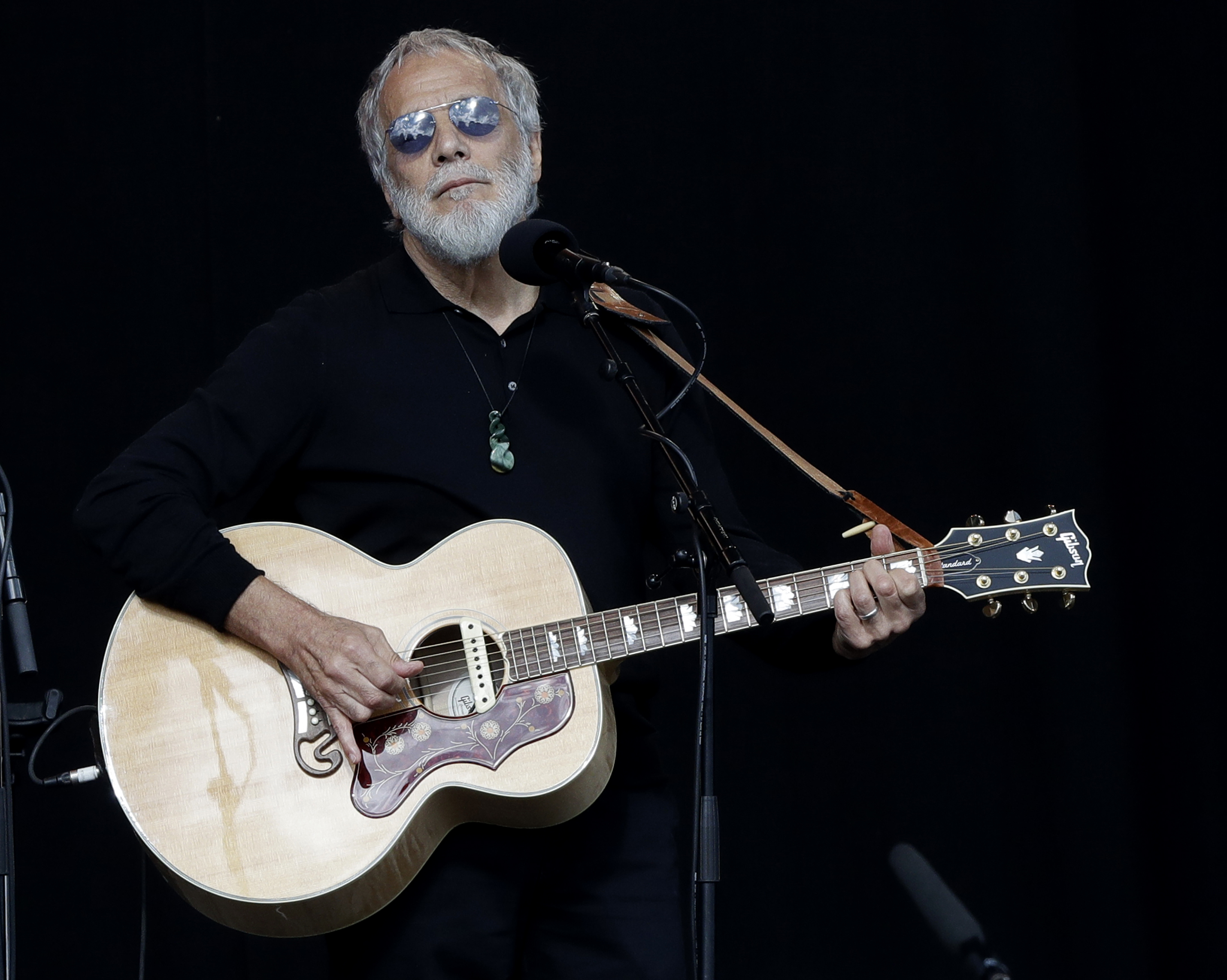 Yusuf Islam/Cat Stevens sings during a national remembrance service in Hagley Park for the victims of the March 15 mosque terrorist attack in Christchurch, New Zealand, Friday, March 29, 2019. (AP Photo/Mark Baker) Yusuf Islam/Cat Stevens sings during a national remembrance service in Hagley Park for the victims of the March 15 mosque terrorist attack in Christchurch, New Zealand, Friday, March 29, 2019. (AP Photo/Mark Baker)