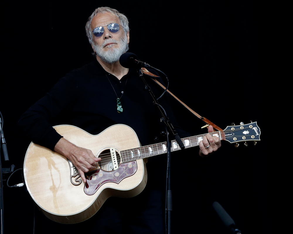 Yusuf Islam/Cat Stevens sings during a national remembrance service in Hagley Park for the victims of the March 15 mosque terrorist attack in Christchurch, New Zealand, Friday, March 29, 2019. (AP Photo/Mark Baker) Yusuf Islam/Cat Stevens sings during a national remembrance service in Hagley Park for the victims of the March 15 mosque terrorist attack in Christchurch, New Zealand, Friday, March 29, 2019. (AP Photo/Mark Baker)