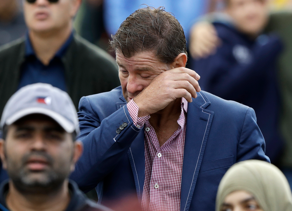 A man wipes a tear from his face during a national remembrance service in Hagley Park for the victims of the March 15 mosque terrorist attack in Christchurch, New Zealand, Friday, March 29, 2019. (AP Photo/Mark Baker) A man wipes a tear from his face during a national remembrance service in Hagley Park for the victims of the March 15 mosque terrorist attack in Christchurch, New Zealand, Friday, March 29, 2019. (AP Photo/Mark Baker)