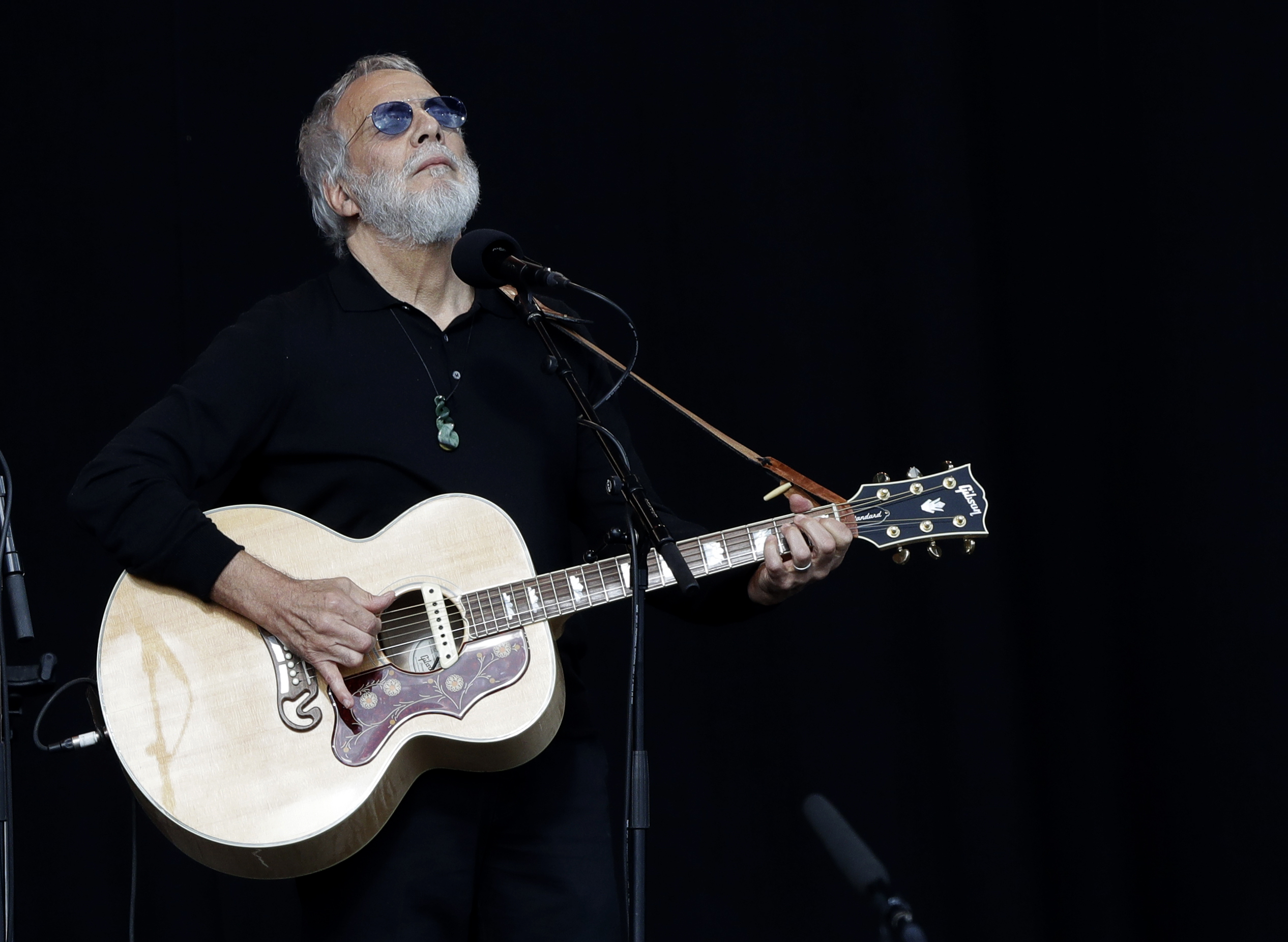 Yusuf Islam/Cat Stevens sings during a national remembrance service in Hagley Park for the victims of the March 15 mosque terrorist attack in Christchurch, New Zealand, Friday, March 29, 2019. (AP Photo/Mark Baker) Yusuf Islam/Cat Stevens sings during a national remembrance service in Hagley Park for the victims of the March 15 mosque terrorist attack in Christchurch, New Zealand, Friday, March 29, 2019. (AP Photo/Mark Baker)