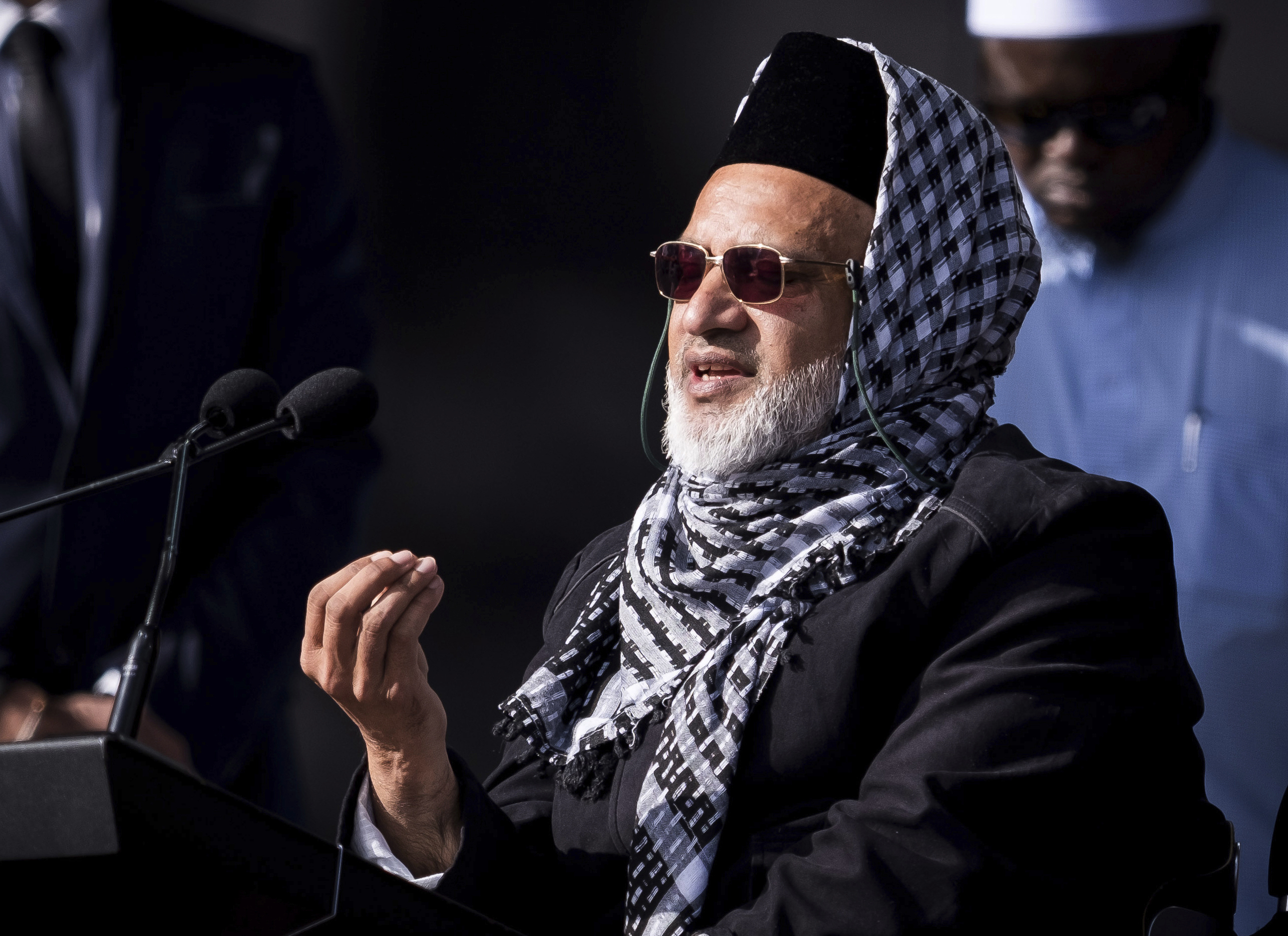 In this photo supplied by the New Zealand government, Mosque shooting survivor Farid Ahmed addresses the national remembrance service in Hagley Park for the victims of the March 15 mosques terrorist attack in Christchurch, New Zealand, Friday, March 29, 2019. (Mark Tantrum/New Zealand Government via AP) In this photo supplied by the New Zealand government, Mosque shooting survivor Farid Ahmed addresses the national remembrance service in Hagley Park for the victims of the March 15 mosques terrorist attack in Christchurch, New Zealand, Friday, March 29, 2019. (Mark Tantrum/New Zealand Government via AP)