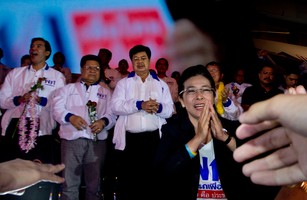 The leader of Pheu Thai Party and candidate for prime minister Sudarat Keyuraphan, right, gestures, during an election rally concluding their campaign ahead of general election in Bangkok, Thailand, Friday, March 22, 2019. The nation's first general election since the military seized power in a 2014 coup is scheduled to be held on March 24. (AP Photo/Gemunu Amarasinghe) The leader of Pheu Thai Party and candidate for prime minister Sudarat Keyuraphan, right, gestures, during an election rally concluding their campaign ahead of general election in Bangkok, Thailand, Friday, March 22, 2019. The nation's first general election since the military seized power in a 2014 coup is scheduled to be held on March 24. (AP Photo/Gemunu Amarasinghe)