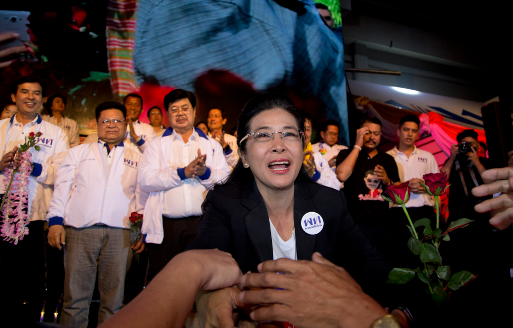 The leader of Pheu Thai Party and candidate for prime minister Sudarat Keyuraphan reaches to shake hands of supporters during an election rally concluding their campaign ahead of general election in Bangkok, Thailand, Friday, March 22, 2019. The nation's first general election since the military seized power in a 2014 coup is scheduled to be held on March 24. (AP Photo/Gemunu Amarasinghe) The leader of Pheu Thai Party and candidate for prime minister Sudarat Keyuraphan reaches to shake hands of supporters during an election rally concluding their campaign ahead of general election in Bangkok, Thailand, Friday, March 22, 2019. The nation's first general election since the military seized power in a 2014 coup is scheduled to be held on March 24. (AP Photo/Gemunu Amarasinghe)