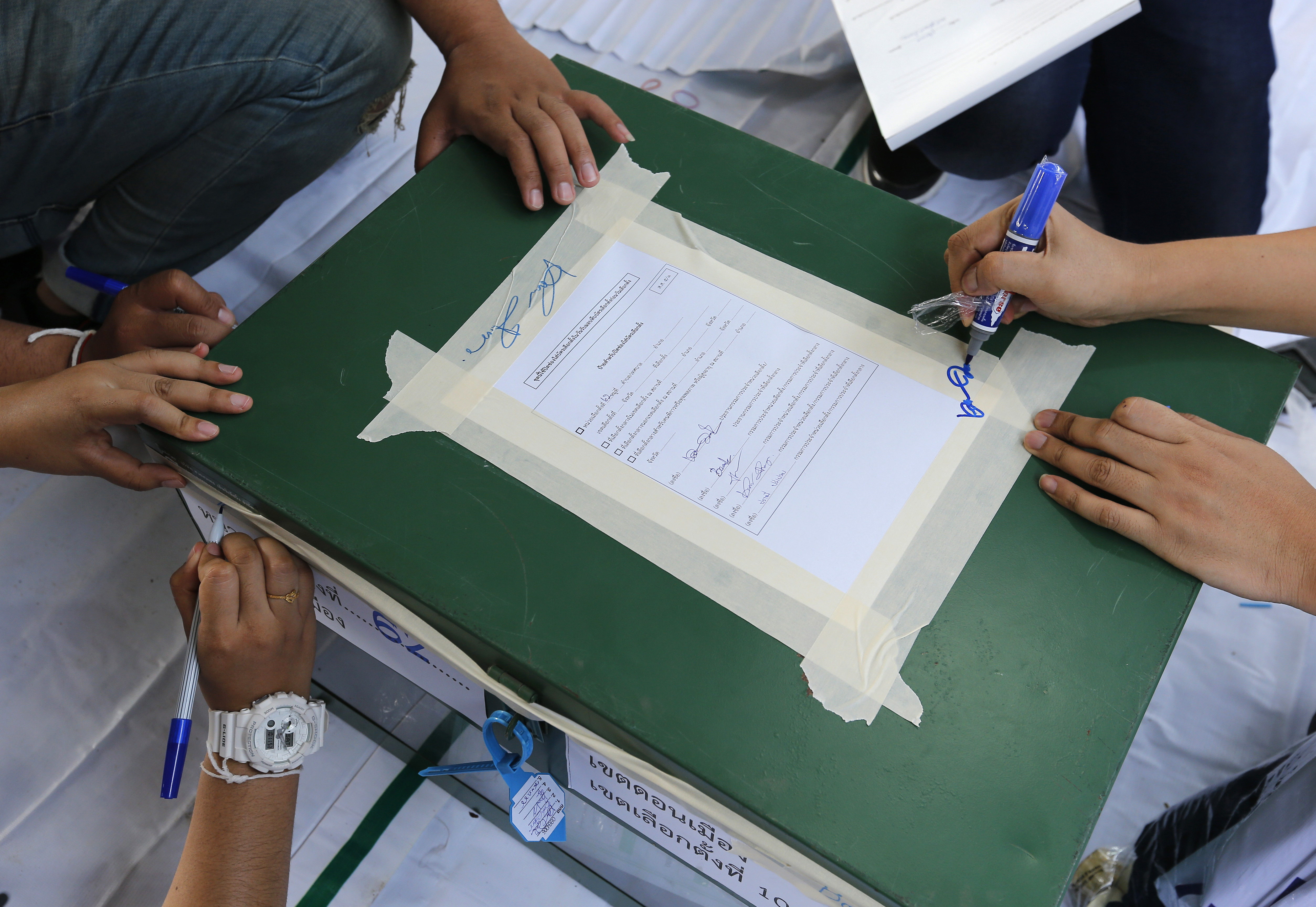 Volunteers prepare ballot boxes ahead of Sunday's general elections Bangkok, Thailand, Saturday, March 23, 2019. The nation's first general election since the military seized power in a 2014 coup is scheduled to be held on March 24. (AP Photo/Sakchai Lalit) Volunteers prepare ballot boxes ahead of Sunday's general elections Bangkok, Thailand, Saturday, March 23, 2019. The nation's first general election since the military seized power in a 2014 coup is scheduled to be held on March 24. (AP Photo/Sakchai Lalit)
