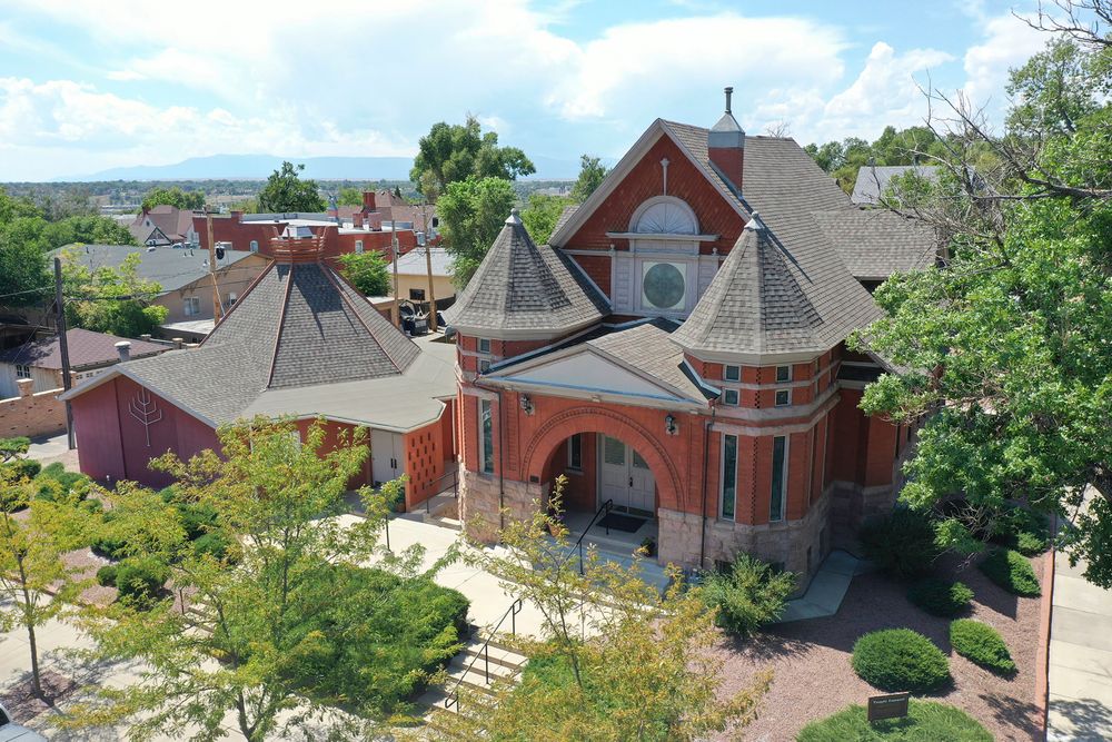 FILE - This Aug. 22, 2019 file photograph shows an aerial view of Temple Emanuel in Pueblo, Colo. The synagogue is planning to add surveillance cameras to enhance its already tight security following the arrest of a man accused of plotting to bomb it. (Zachary Allen/The Pueblo Chieftain file via AP, File) FILE - This Aug. 22, 2019 file photograph shows an aerial view of Temple Emanuel in Pueblo, Colo. The synagogue is planning to add surveillance cameras to enhance its already tight security following the arrest of a man accused of plotting to bomb it. (Zachary Allen/The Pueblo Chieftain file via AP, File)