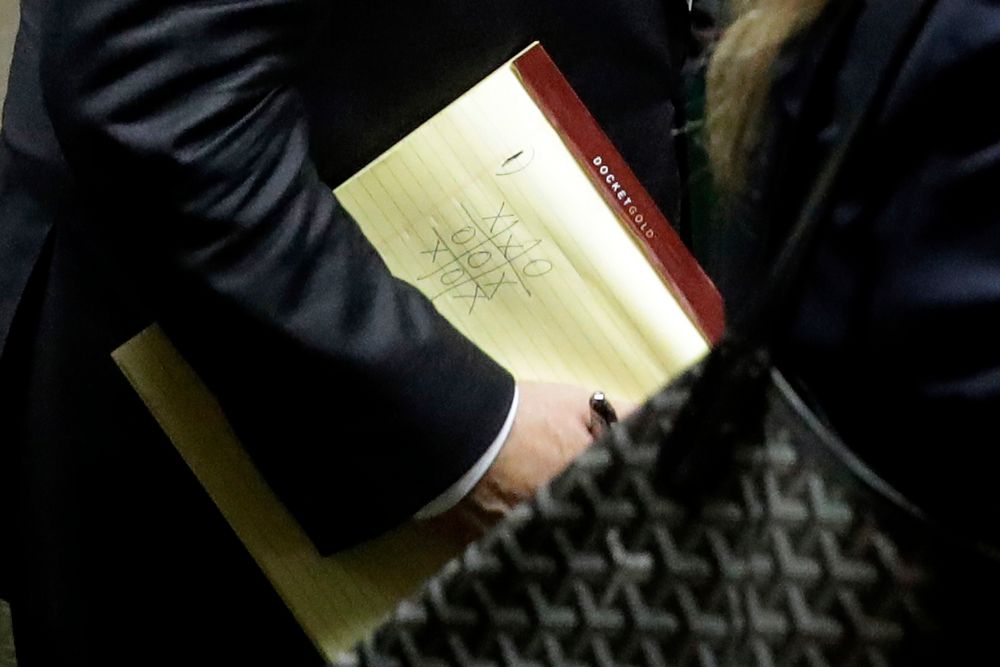 Former movie mogul Harvey Weinstein, carrying a pad with a Tic-Tac-Toe game, leaves State Supreme Court following a hearing related to his sexual assault case, Thursday, July 11, 2019, in New York. Weinstein's lawyer Jose Baez went to court Thursday to get a judge's permission to leave the case, the latest defection from what was once seen as a modern version of O.J. Simpson's Former movie mogul Harvey Weinstein, carrying a pad with a Tic-Tac-Toe game, leaves State Supreme Court following a hearing related to his sexual assault case, Thursday, July 11, 2019, in New York. Weinstein's lawyer Jose Baez went to court Thursday to get a judge's permission to leave the case, the latest defection from what was once seen as a modern version of O.J. Simpson's