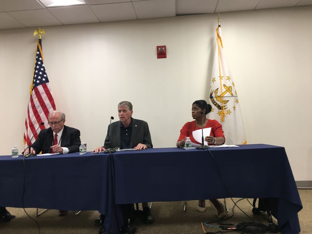 EOHHS Secretary Womazetta Jones (right) speaks at a news conference with Gov. Dan McKee (center) and BHDDH director Richard Charest (left)