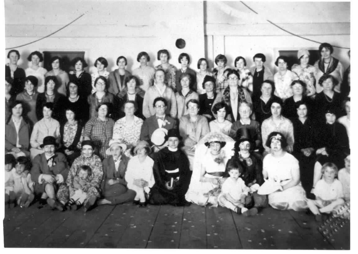 The Hall, in front of fireplace, year unknown The Hall, in front of fireplace, year unknown